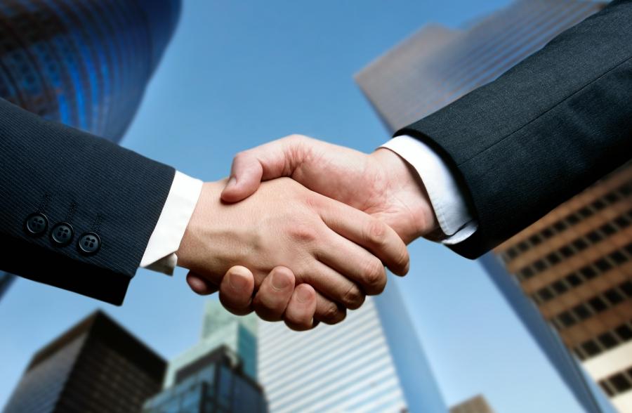 Handshake representing successful landlord and tenant agreements