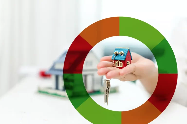 Real estate agent holding a house model and keys