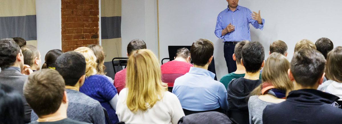 adults in a credit repair class classroom